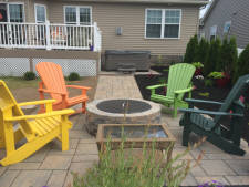 Hardscaped fire pit and patio Installed by Aaron of Landscape Solutions. Rochester NY. 14616

585-342-5296