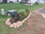 Landscaping flower bed with stone border Installed by Aaron of Landscape Solutions. Rochester NY. 14616

585-342-5296