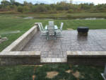 Custom patio hardscape with fire pit made of paver blocks.

Installed by Aaron of Landscape Solutions. Rochester NY. 14616

585-342-5296